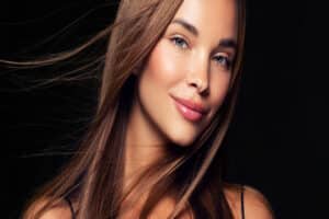 Woman with acne free skin after chemical peel in Austin, TX